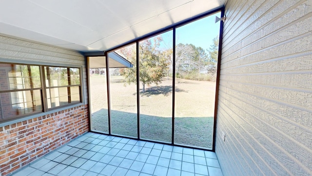 unfurnished sunroom with a healthy amount of sunlight