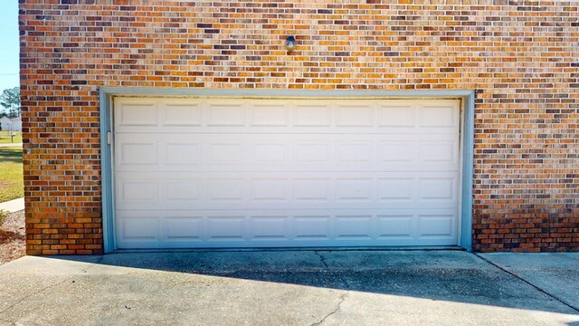 garage with driveway