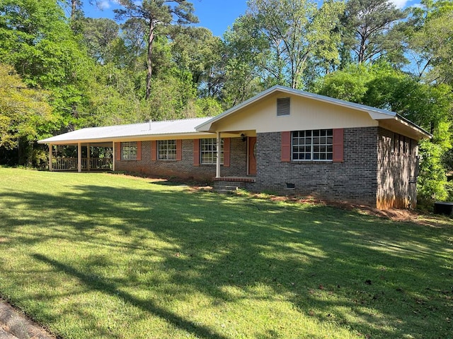 105 Martinson Dr, Abbeville, AL 36310 - ranch-style home featuring crawl space, brick siding, and a front yard