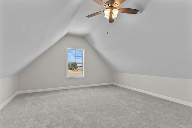 bonus room featuring light colored carpet and lofted ceiling