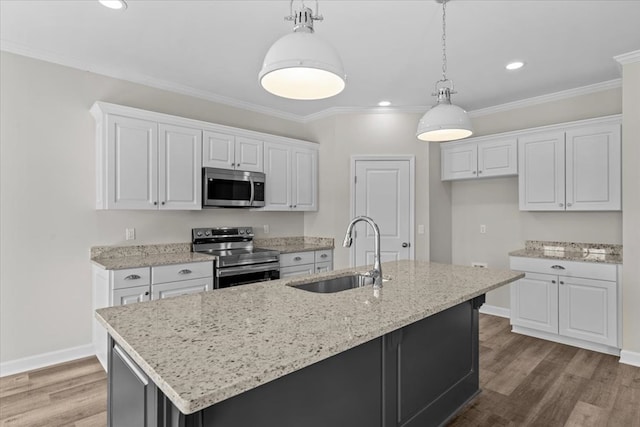 kitchen featuring white cabinetry, appliances with stainless steel finishes, and sink