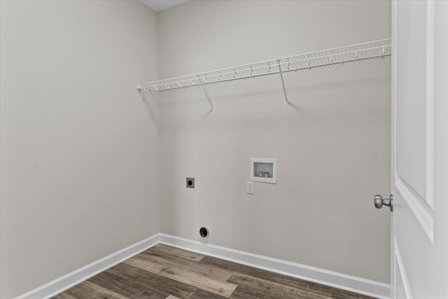 washroom featuring electric dryer hookup, washer hookup, and dark hardwood / wood-style floors