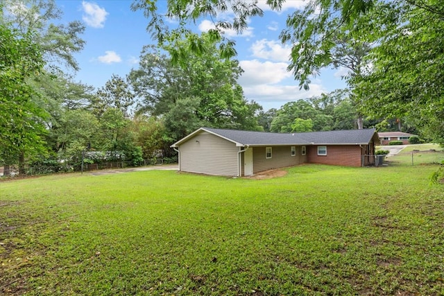 1401 Deese Rd, Ozark, AL 36360 - fenced backyard featuring view of scattered trees