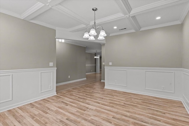 1401 Deese Rd, Ozark, AL 36360 - spare room featuring light wood-style flooring, a chandelier, coffered ceiling, beamed ceiling, and recessed lighting