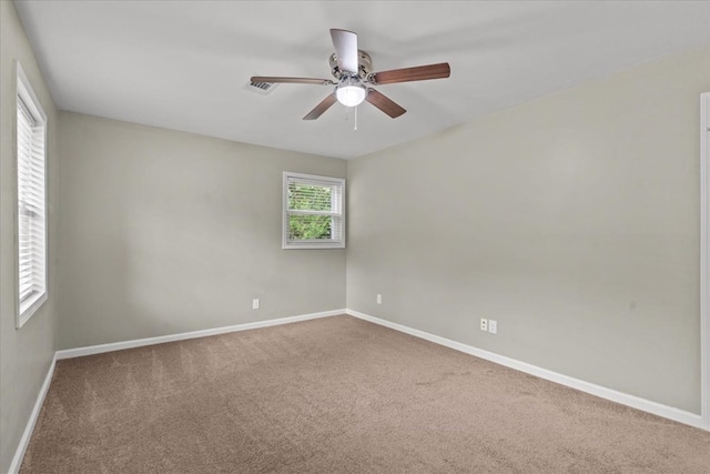 1401 Deese Rd, Ozark, AL 36360 - spare room with a ceiling fan and carpet