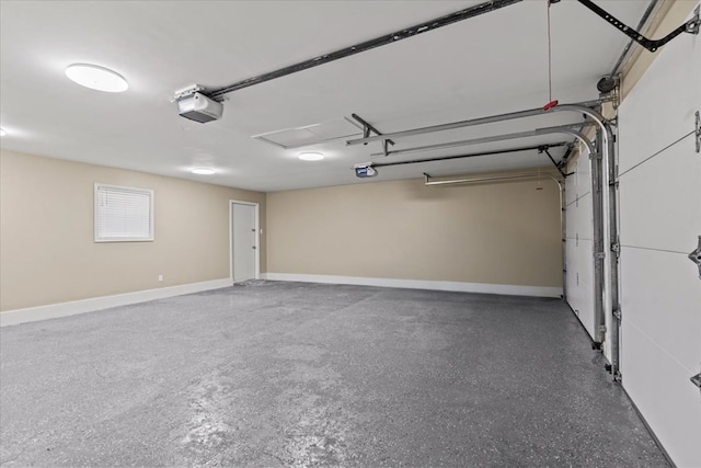 1401 Deese Rd, Ozark, AL 36360 - garage featuring a garage door opener and baseboards