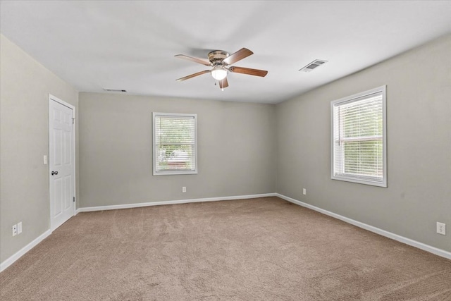 1401 Deese Rd, Ozark, AL 36360 - carpeted empty room featuring a ceiling fan and baseboards