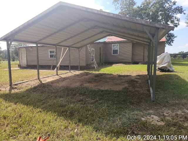 view of vehicle parking featuring a carport and a lawn