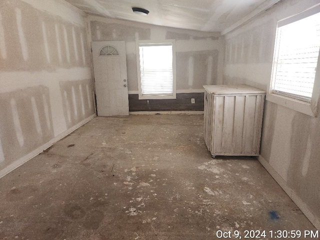 interior space featuring lofted ceiling