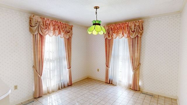 709 Rosemont Dr, Dothan, AL 36303 - spare room with baseboards, light tile patterned flooring, and wallpapered walls