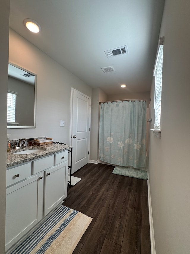 330 Gritney, Daleville, AL 36322 - full bath featuring wood finished floors, vanity, recessed lighting, and curtained shower