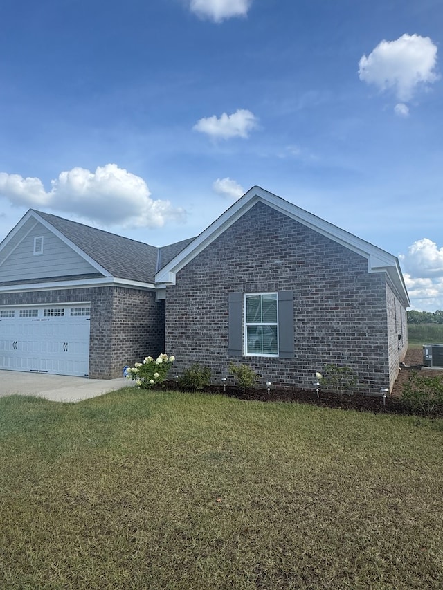 330 Gritney, Daleville, AL 36322 - ranch-style home with brick siding, an attached garage, and a front yard
