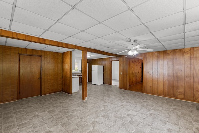1105 Deborah St, Dothan, AL 36301 - finished below grade area featuring freestanding refrigerator, a paneled ceiling, wood walls, and a ceiling fan
