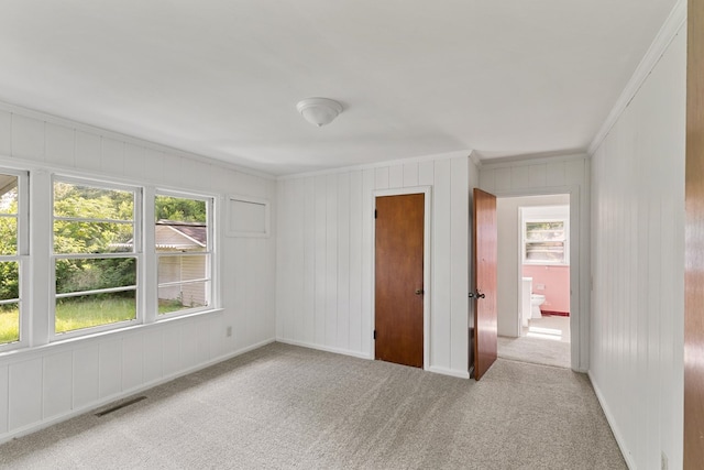 1105 Deborah St, Dothan, AL 36301 - unfurnished bedroom with crown molding, carpet, and multiple windows