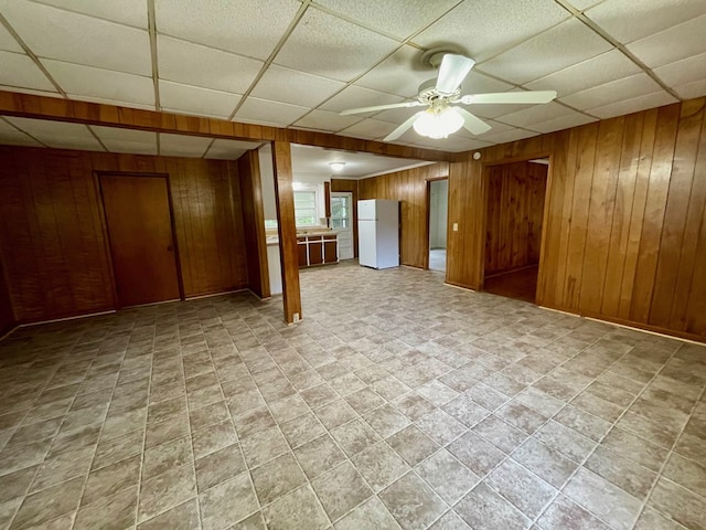 1105 Deborah St, Dothan, AL 36301 - unfurnished room with a paneled ceiling, wooden walls, and ceiling fan
