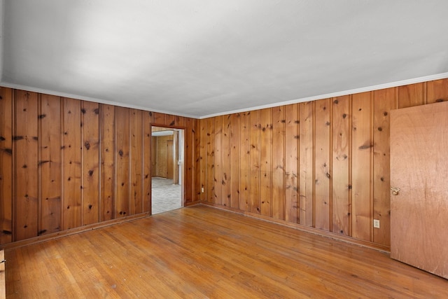 1105 Deborah St, Dothan, AL 36301 - unfurnished room with wood finished floors, wooden walls, and crown molding