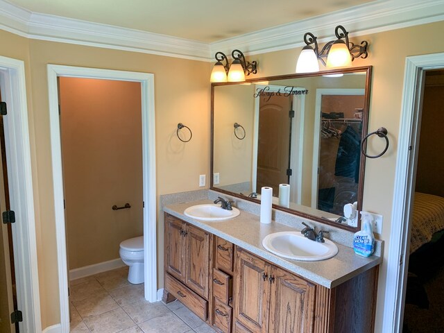 708 Sandstone Dr, Dothan, AL 36303 - bathroom with double vanity, crown molding, and tile patterned flooring