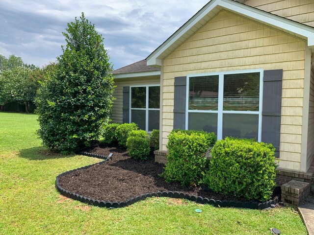 708 Sandstone Dr, Dothan, AL 36303 - view of property exterior featuring a yard