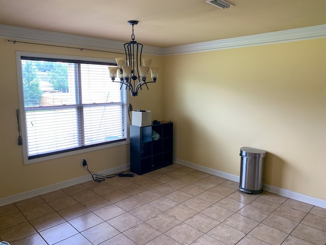 708 Sandstone Dr, Dothan, AL 36303 - unfurnished dining area featuring a chandelier, healthy amount of natural light, light tile patterned floors, and ornamental molding