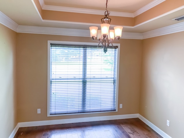 708 Sandstone Dr, Dothan, AL 36303 - unfurnished room with a chandelier, wood finished floors, a raised ceiling, and crown molding