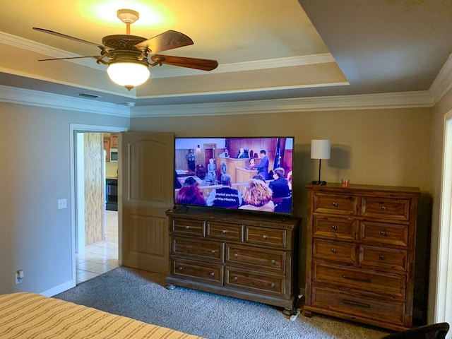 708 Sandstone Dr, Dothan, AL 36303 - bedroom with a tray ceiling, light colored carpet, ornamental molding, and a ceiling fan