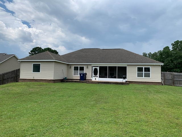 708 Sandstone Dr, Dothan, AL 36303 - rear view of house featuring a sunroom, a fenced backyard, and roof with shingles