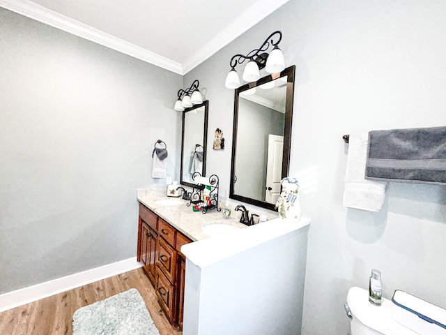 office area with hardwood / wood-style floors, ceiling fan, and crown molding