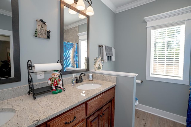 bathroom with ornamental molding, a shower with curtain, vanity, wood-type flooring, and toilet