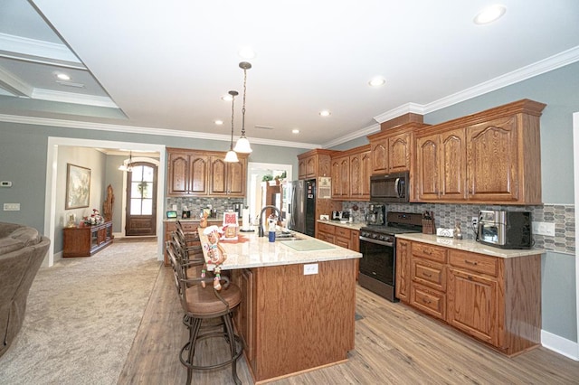 carpeted living room with beam ceiling, ornamental molding, and coffered ceiling