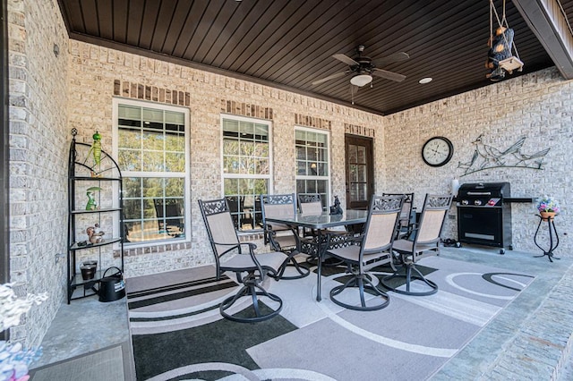 exterior space featuring ceiling fan