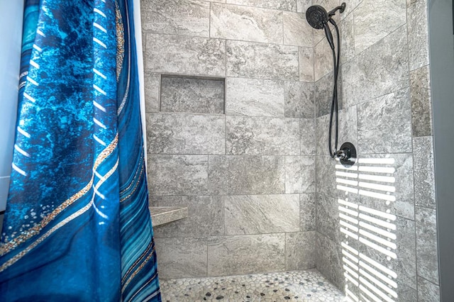 bathroom with curtained shower