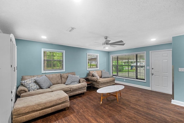 6970 Walden Dr, Kinsey, AL 36303 - living area with dark wood-style flooring, a textured ceiling, a ceiling fan, plenty of natural light, and recessed lighting