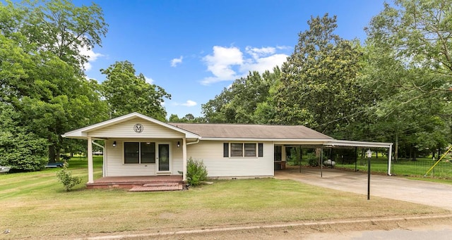 6970 Walden Dr, Kinsey, AL 36303 - view of front of property featuring a porch, an attached carport, driveway, and crawl space