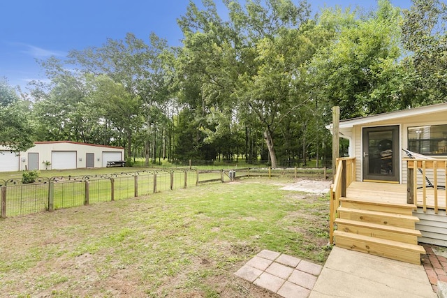 6970 Walden Dr, Kinsey, AL 36303 - view of yard with a garage and view of scattered trees