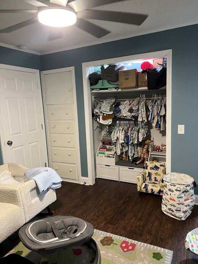6970 Walden Dr, Kinsey, AL 36303 - bedroom featuring a closet, wood finished floors, a ceiling fan, and crown molding