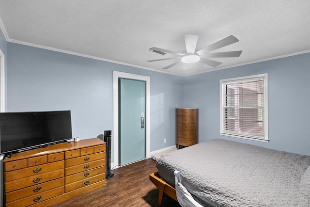 6970 Walden Dr, Kinsey, AL 36303 - bedroom with dark wood finished floors, ornamental molding, a textured ceiling, and a ceiling fan