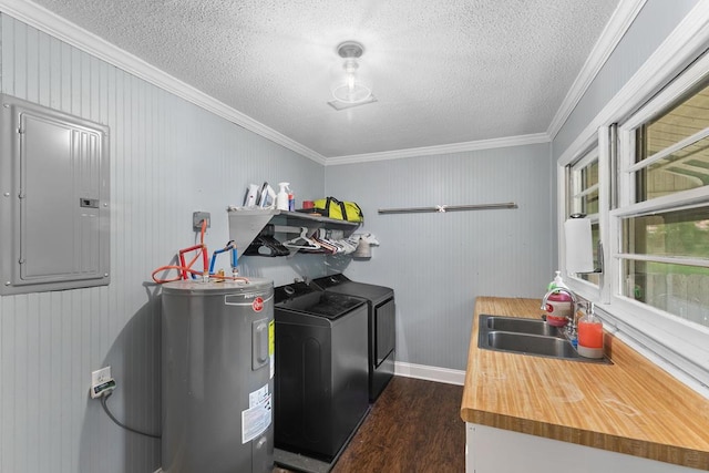 6970 Walden Dr, Kinsey, AL 36303 - washroom with water heater, electric panel, washing machine and dryer, ornamental molding, and dark wood finished floors
