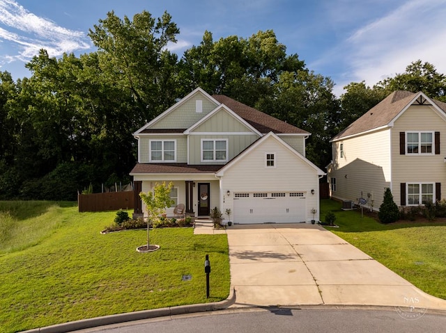 craftsman house featuring central AC unit, a garage, and a front lawn