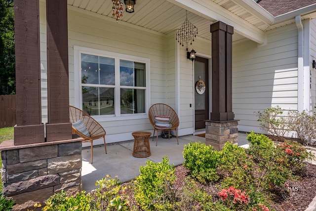 property entrance featuring covered porch