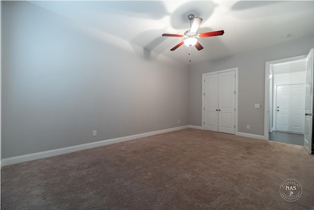 unfurnished bedroom featuring ceiling fan and carpet floors