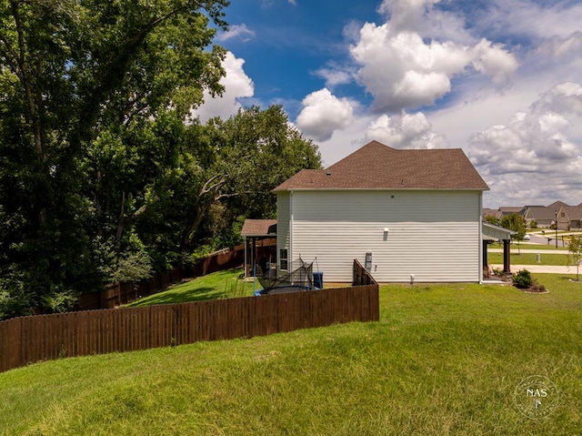 view of property exterior featuring a yard