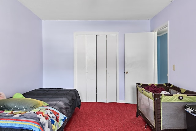 1303 Highland Dr, Elba, AL 36323 - bedroom with carpet flooring and a closet