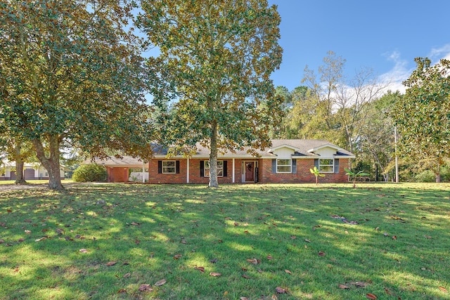 1303 Highland Dr, Elba, AL 36323 - single story home featuring a front yard and brick siding