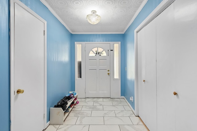 1303 Highland Dr, Elba, AL 36323 - entrance foyer featuring light marble finish flooring and crown molding