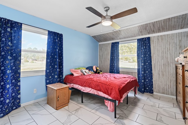 1303 Highland Dr, Elba, AL 36323 - bedroom with light marble finish floors, ceiling fan, and wooden walls