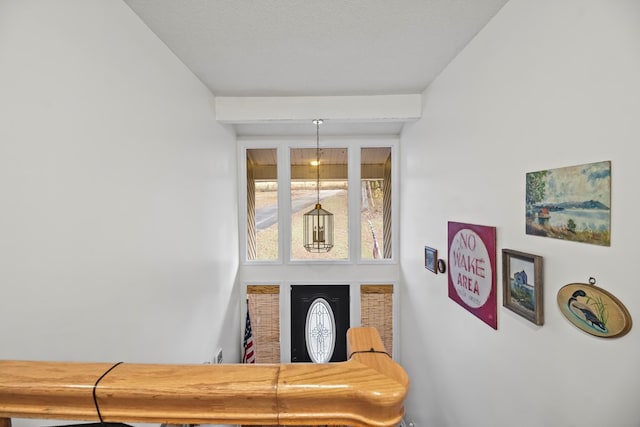 interior space with a textured ceiling