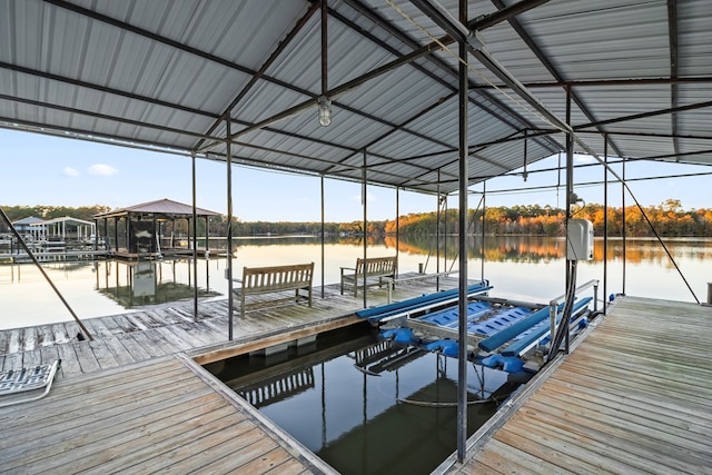 dock area featuring a water view