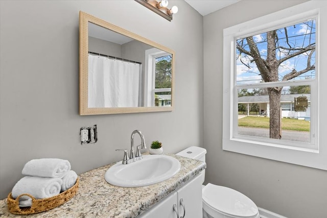 1301 S Bell St, Dothan, AL 36301 - bathroom featuring vanity and toilet