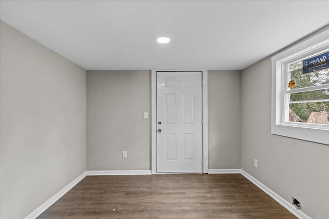 1301 S Bell St, Dothan, AL 36301 - spare room featuring baseboards, dark wood-type flooring, and recessed lighting