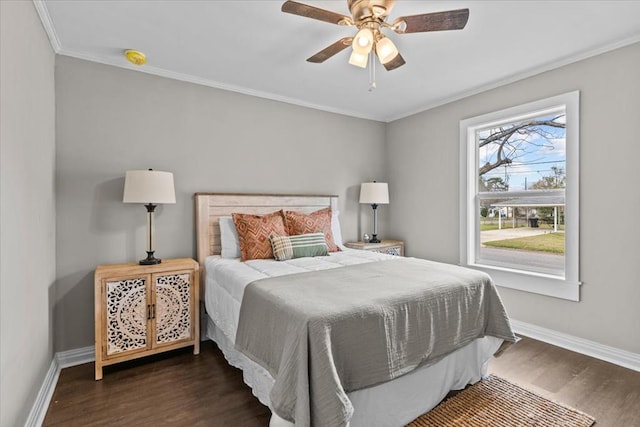 1301 S Bell St, Dothan, AL 36301 - bedroom featuring baseboards, dark wood-style floors, crown molding, and ceiling fan